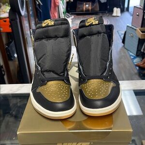 Nike Air High-Top Sneakers in Black and Gold